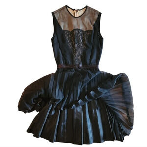 Vintage Lee Jordan Black midi accordion dress.